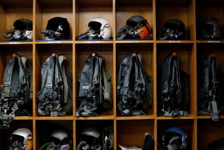 NASA astronaut flight gear is shown in a pre-flight ready room in Houston Texas