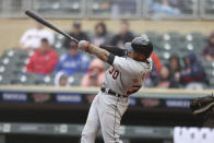 Detroit Tigers' Harold Castro follows hits a home run in the eighth inning of a baseball game against the Minnesota Twins, Wednesday, May 25, 2022, in Minneapolis. Detroit won 4-2 in 10 innings. (AP Photo/Stacy Bengs)