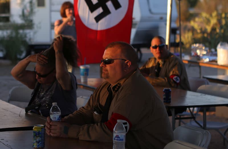 Burt Colucci of the white nationalist group National Socialist Movement attends a rally in Maricopa, Arizona