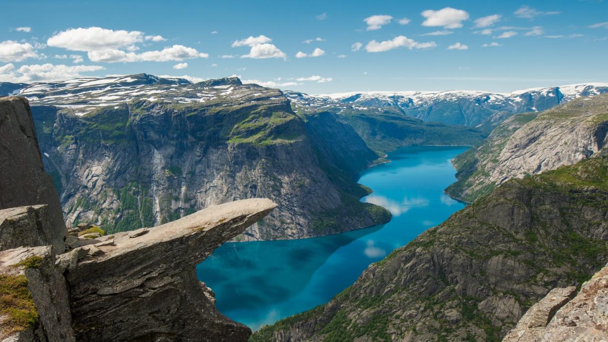  The Trolltunga rock formation affords gorgeous views of Ringedalsvatnet Lake in Norway. 