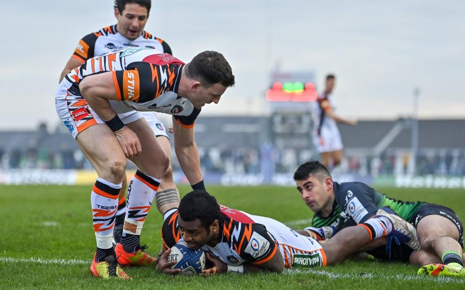 Kini Murimurivalu of Leicester Tigers is congratulated by teammate Matt Scott after scoring their side's second try despite the tackle of Tiernan OHalloran of Connacht during the Heineken Champions Cup Pool B match between Connacht and Leicester Tigers at The Sportsground in Galway. - GETTY IMAGES