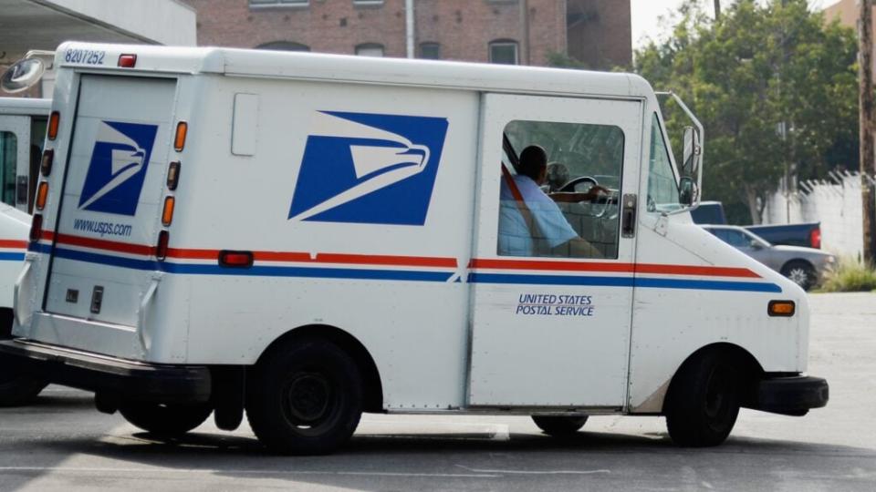 Mail carriers in Chicago are threatening to stop delivering mail in some neighborhoods after a postal worker was shot on her route earlier this month. (Photo by Kevork Djansezian/Getty Images)