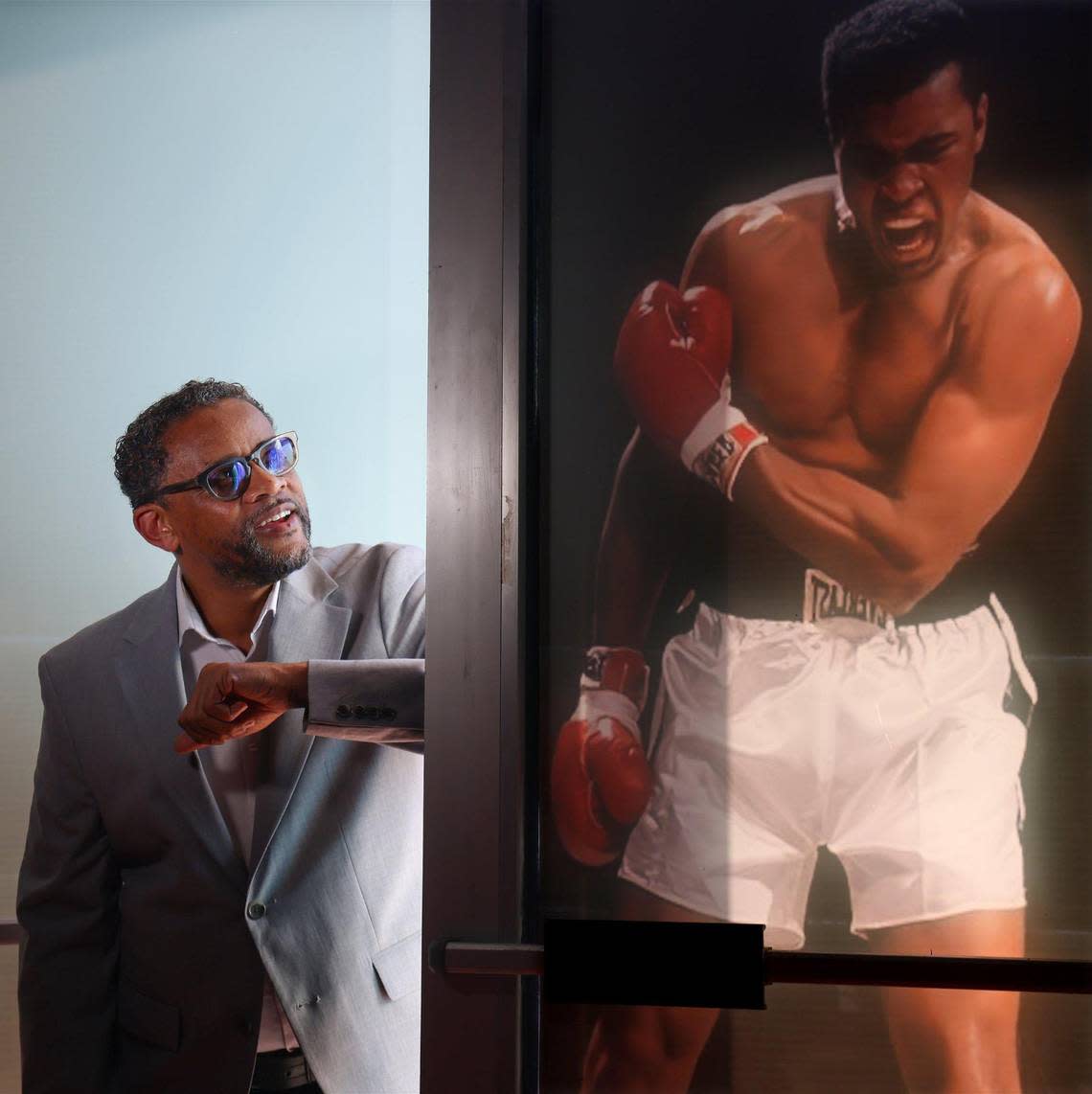 Washington Avenue BID executive director Troy Wright is photographed among the items at the exhibit reflecting on the 60th Anniversary of the Ali and Sonny Liston fight through photographs, personal items is opening soon in celebration of Ali’s legacy.