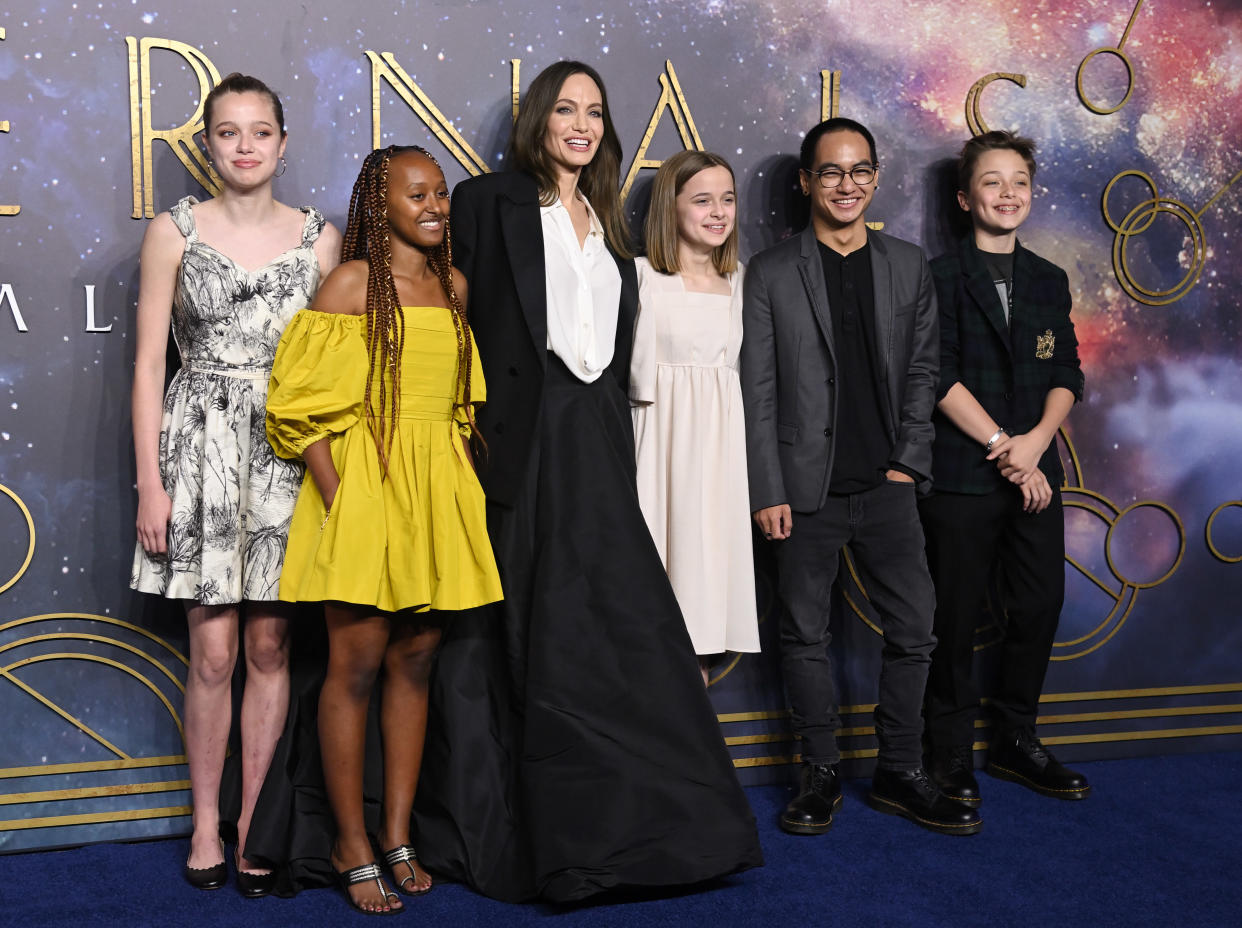 Shiloh Jolie-Pitt, Zahara Jolie-Pitt, Angelina Jolie, Vivienne Jolie-Pitt, Maddox Jolie-Pitt and Knox Jolie-Pitt attend the The Eternals U.K. premiere. 