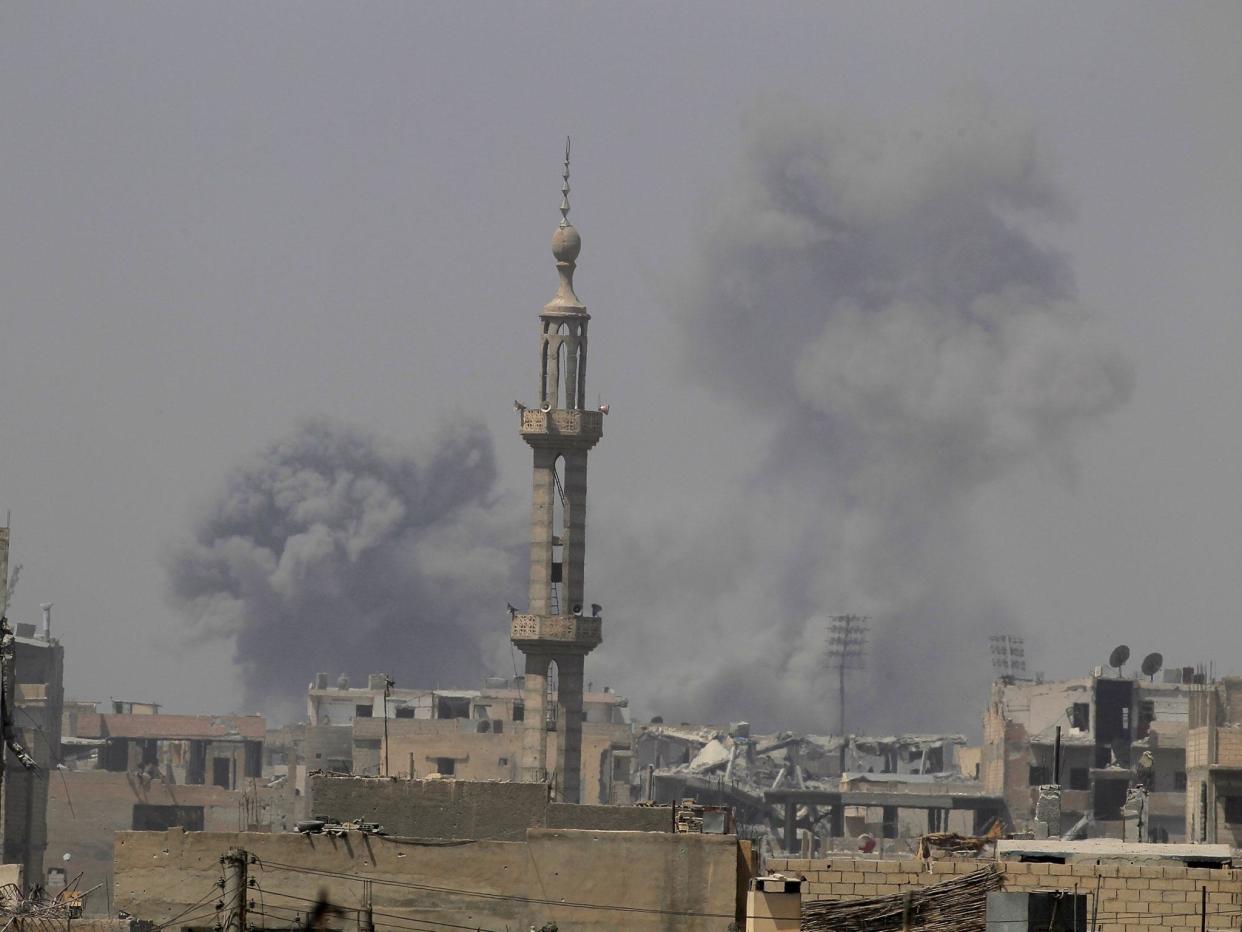 Smoke rises after an air strike during fighting between members of the Syrian Democratic Forces and Islamic State militants in Raqqa, Syria: REUTERS/Zohra Bensemra