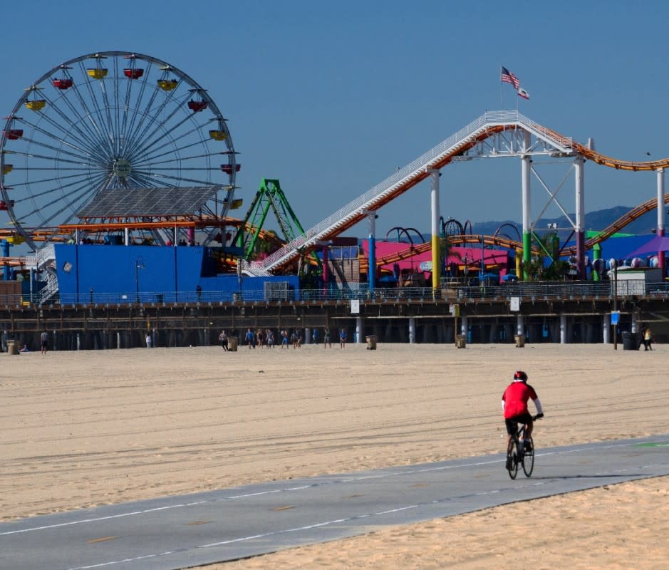 Santa Monica Pier's iconic Pacific Wheel is the world's only solar-powered Ferris Wheel. For another classic spin, rent a bicycle and join the wheeled crowd along the flat, breezy, 22-mile Marvin Braude Bike Trail, tracing the coast from Pacific Palisades to Torrance.<p>Mitch Diamond/Getty Images</p>