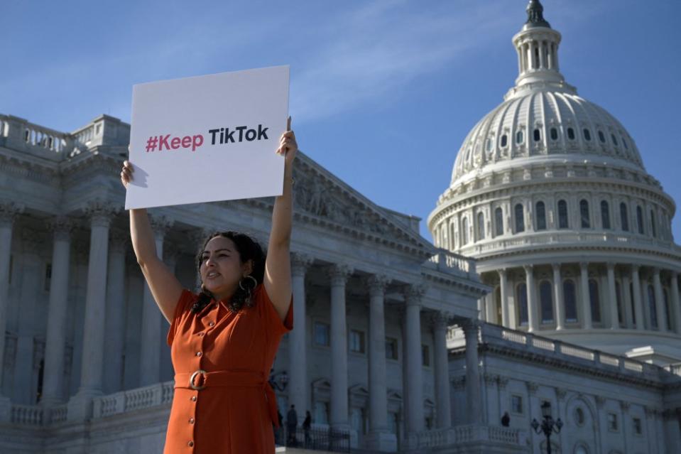 A demonstrator outside the Capitol following a press conference by TikTok creators to voice their opposition to the “Protecting Americans from Foreign Adversary Controlled Applications Act.” REUTERS