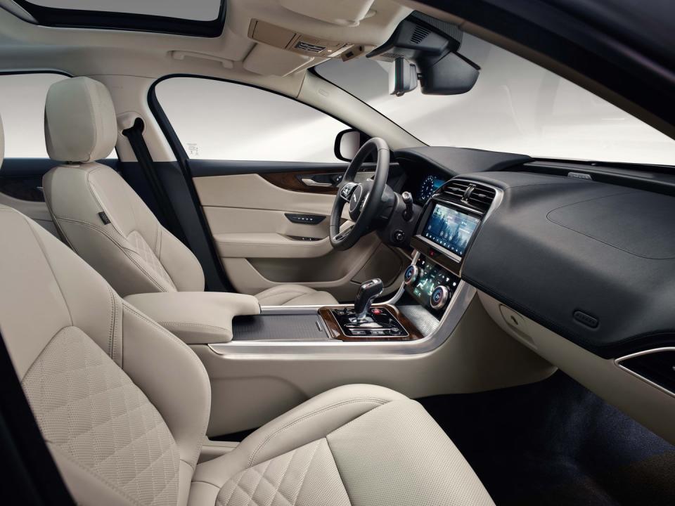 <p>A new steering wheel is brought over from the I-Pace, and the new electronic shifter has been taken from the F-type, as has a new driving-mode toggle switch. Jaguar has redesigned the XE's door panels and armrests, which it says has increased storage space and improved comfort.</p>