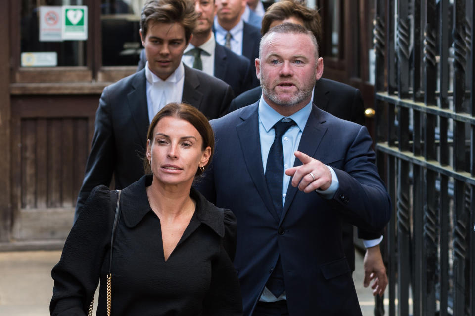 Wayne Rooney and Coleen Rooney leaving court