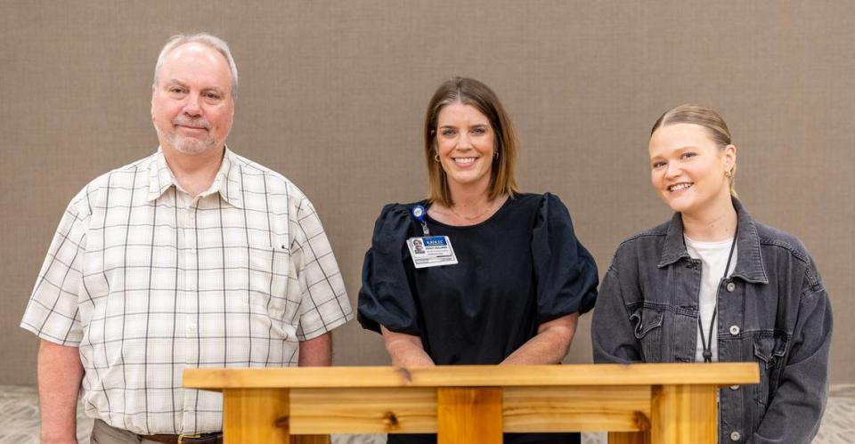 Andrew Porter (left), Emily Volland (center), and April Biondolillo (right) spoke at a press conference on Monday, Aug. 7, 2023 on donating bottled water for those in need.