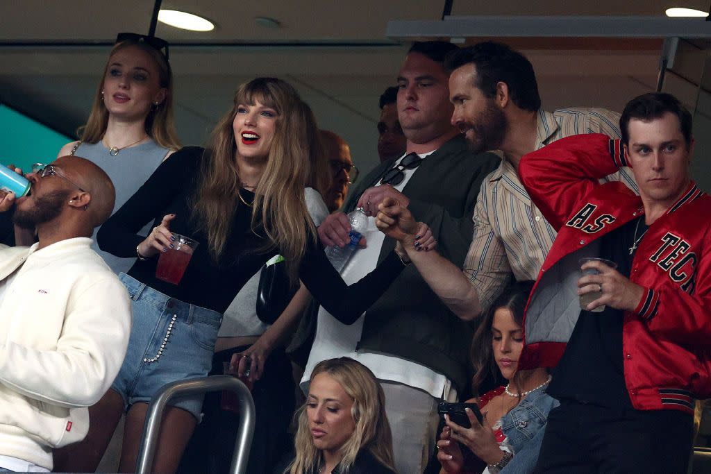 east rutherford, new jersey october 01 l r singer taylor swift and actor ryan reynolds talk prior to the game between the kansas city chiefs and the new york jets at metlife stadium on october 01, 2023 in east rutherford, new jersey photo by elsagetty images