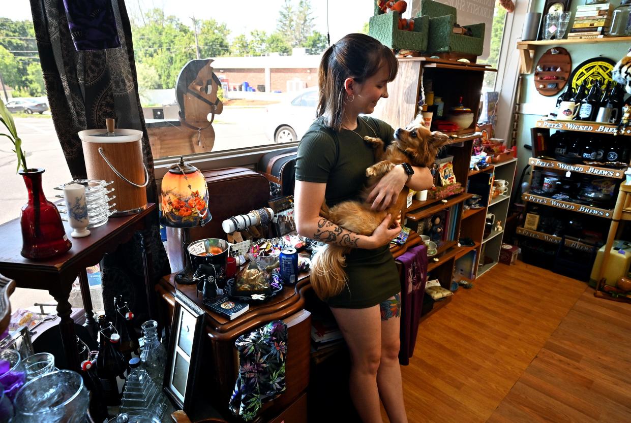 Vintage Rebel Curiosity Shop owner Hayley Worthington with her chiweenie, Kiwi.