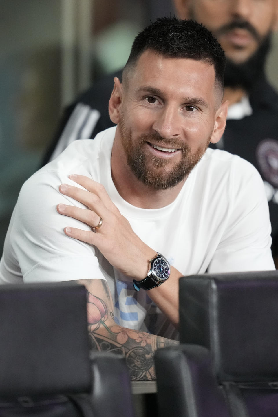 Inter Miami forward Lionel Messi watches from his box on the sideline at the start of an MLS soccer match between Inter Miami and Charlotte FC, Wednesday, Oct. 18, 2023, in Fort Lauderdale, Fla. (AP Photo/Rebecca Blackwell)