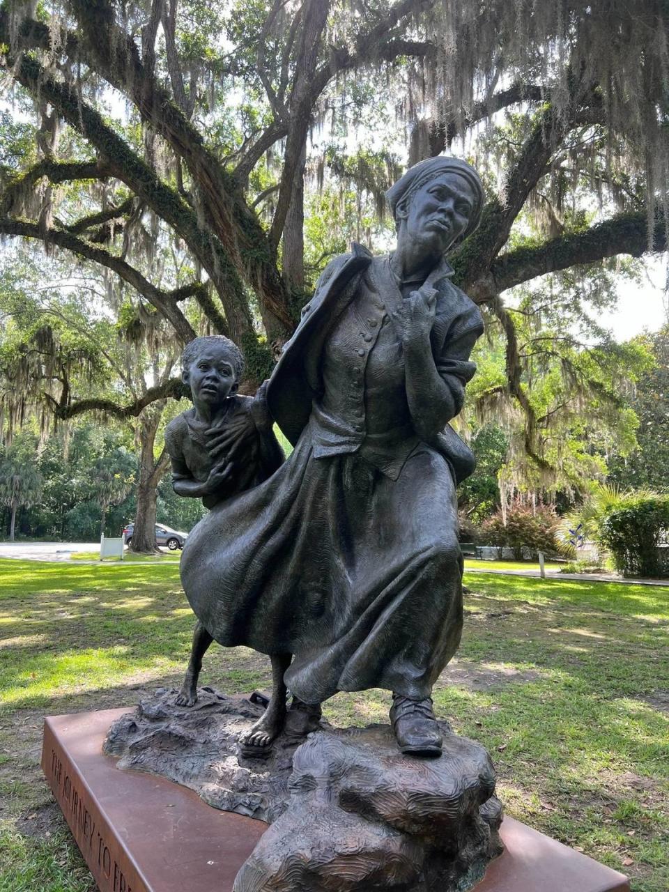 “The Journey to Freedom” depicts Tubman protecting a child slave and guiding them to freedom.