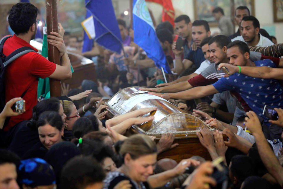 <p>Friends and family members of the victims of the terrorist attack by armed men on a bus carrying coptic Christians can be seen mournning in Al-Minya, Egypt. At leat 28 were killed. (Photo: DPA via ZUMA Press) </p>