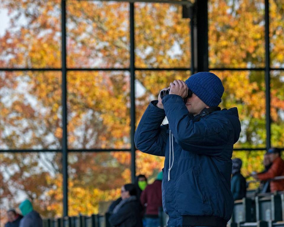 Fans and horse trainers including Allen Hardy watched horses train at Keeneland.