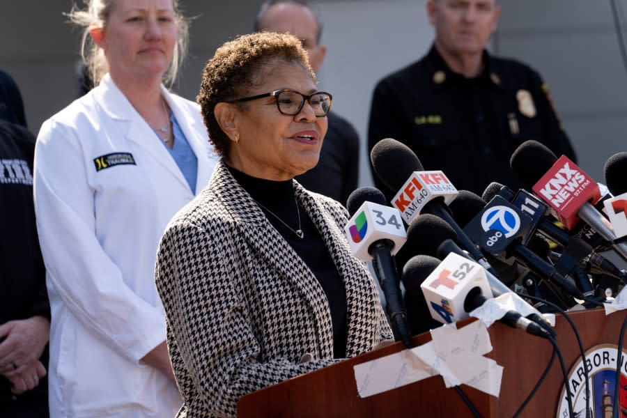 Flanked by medical staff and fire department personnel Los Angeles Mayor Karen Bass, talks during a news conference at Harbor–UCLA Medical Center in the West Carson area of Los Angeles on Thursday, Feb. 15, 2024. (AP Photo/Richard Vogel)