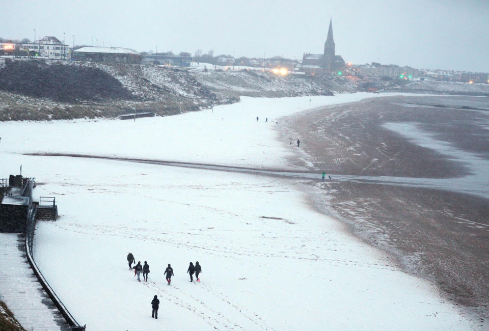 <p>A snowy Tynemouth beach, following heavy overnight snowfall on Monday night which has caused disruption across Britain. (PA) </p>