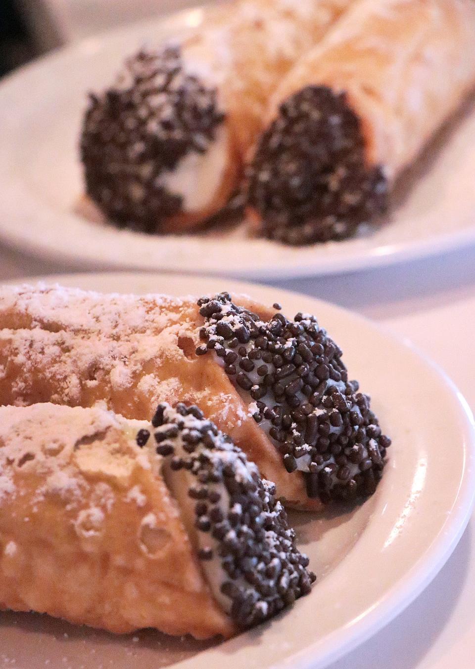 Homemade cannolis at Paradise Pizza are $2.99 each. Customers can also get Junior's Cheesecake slices for $7.95.
