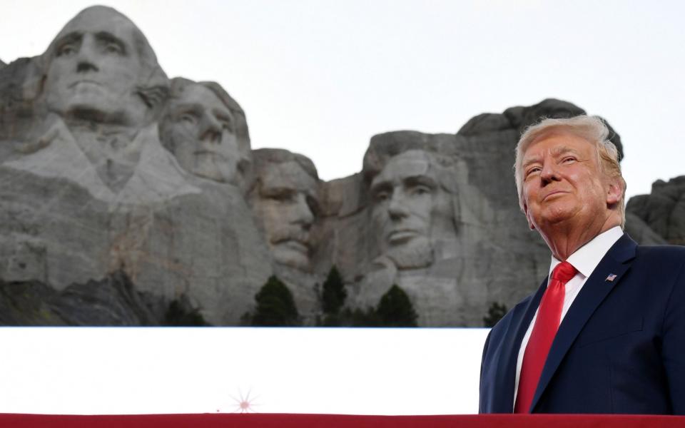 Donald Trump during a speech at Mount Rushmore for July 4 - SAUL LOEB/AFP via Getty Images