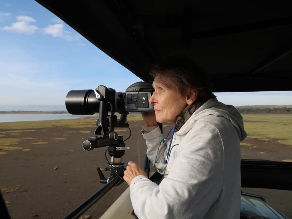 Roberta Bondar is seen here at the edge of Lake Elementaita, Kenya, watching for lesser flamingoes. Dr. Bondar celebrates the 30th anniversary of her voyage into space on Jan. 22. (Submitted by Roberta Bondar - image credit)