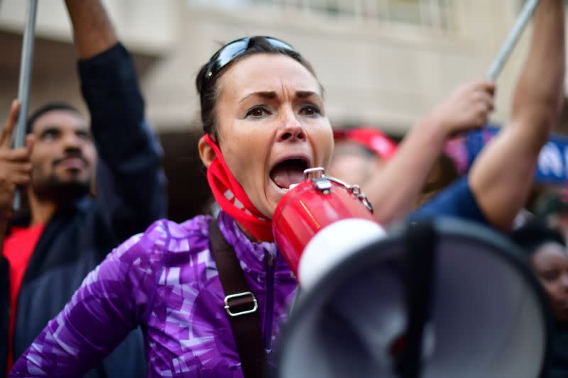 A supporter of U.S. President Donald Trump yells at a supporter of Democratic presidential nominee Joe Biden in Philadelphia