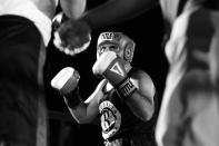 <p>Sgt. Russell Rodin is seen between opponent Sgt. Billy Gattis and the referee during a grudge match at the Brooklyn Smoker in the parking lot of Gargiulo’s Italian restaurant in Coney Island, Brooklyn, on Aug. 24, 2017. (Photo: Gordon Donovan/Yahoo News) </p>