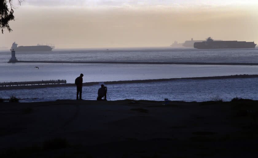 SAN PEDRO, CA - OCTOBER 26, 2014: Five container ships just outside the Angels Gate entrance to the port of Los Angeles seen from the cliffs at Point Fermin park in San Pedro on OCTOBER 26, 2014. ( Bob Chamberlin / Los Angeles Times )