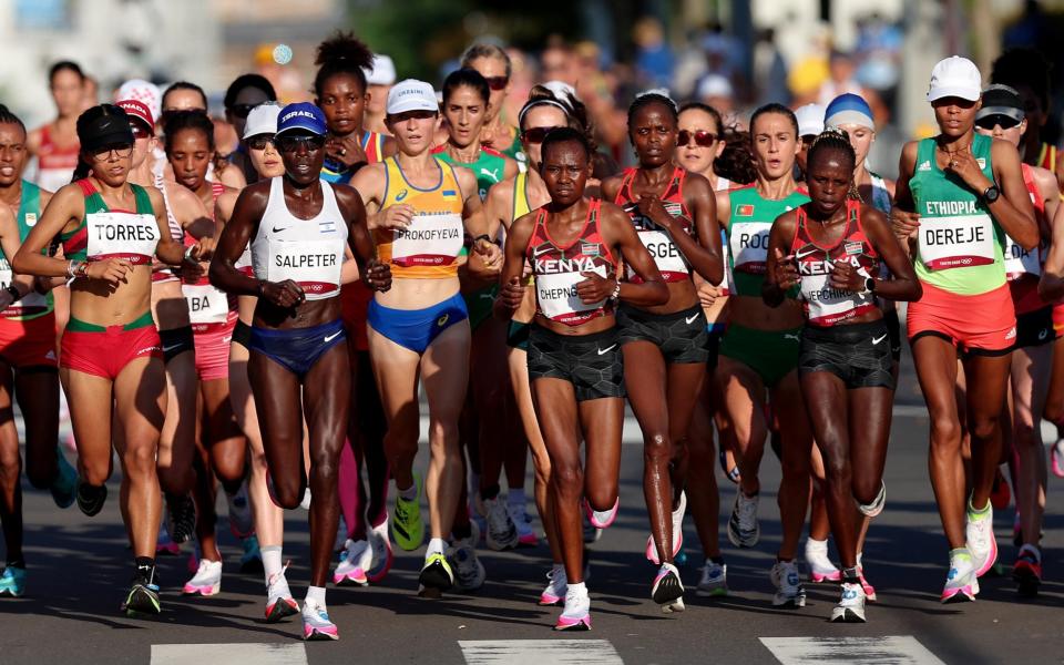 Ruth Chepngetich of Team Kenya leads the pack in the Women's Marathon Final on day fifteen of the Tokyo 2020 Olympic Games at Kasumigaseki Country Club on August 07, 2021 in Kawagoe, Japan - Getty Images AsiaPac 