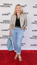 <p> Straight-leg denim is one of the best jeans styles for versatility. Cattrall stepped out in a pair at the Modern Love With Kim Cattrall premiere at the Tribeca Festival in New York in 2023. She paired them with a black top, silver collarless jacket, pink heeled sandals and a large baby blue Gladstone handbag. </p>
