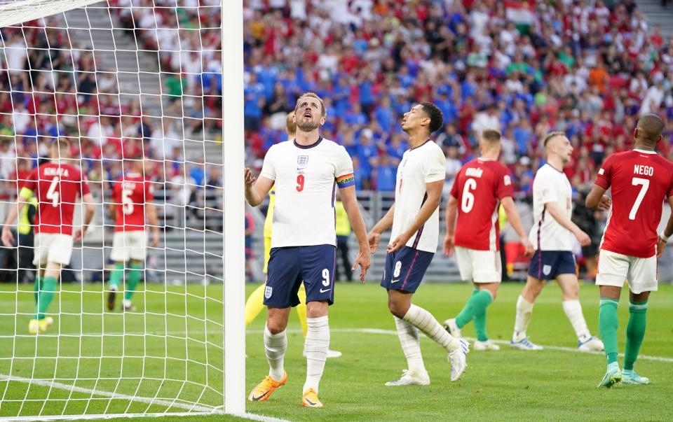 England's Harry Kane and Jude Bellingham react during the UEFA Nations League match at the Puskas Arena, Budapest. - PA