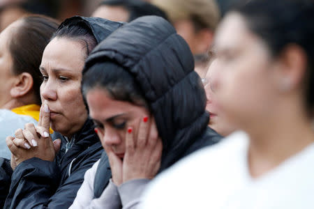 Faithful gesture as Pope Francis celebrate holy mass at Simon Bolivar park in Bogota, Colombia September 7, 2017. REUTERS/Jaime Saldarriaga