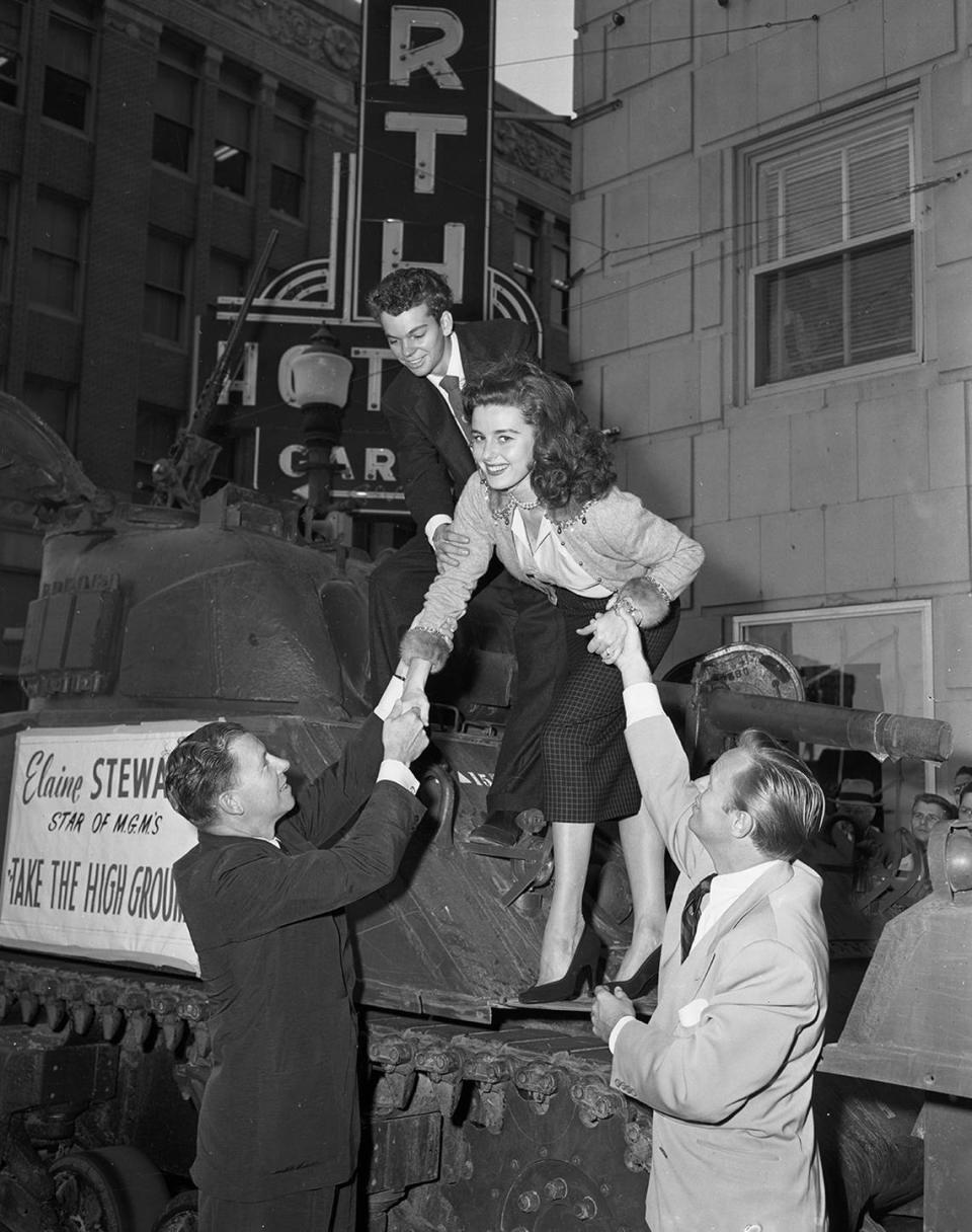 Sept. 26, 1953: “Elaine Stewart, MGM’s newest glamour girl, shows how to descend gracefully from a tank on her arrival in Fort Worth with an assist from George Murphy, left, and Richard Widmark, while Russ Tamblyn is ready to shove from behind.” Fort Worth Star-Telegram archives/UT Arlington Special Collections