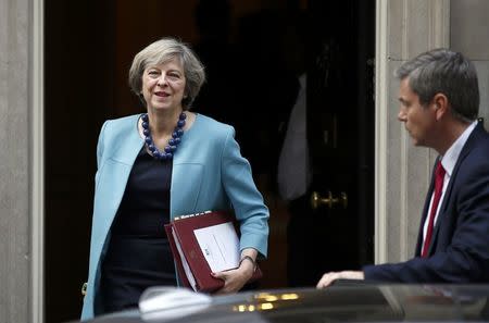 Britain's Prime Minister, Theresa May, leaves 10 Downing Street to attend Prime Minister's Questions in the House of Commons, in London, Britain October 26, 2016. REUTERS/Peter Nicholls