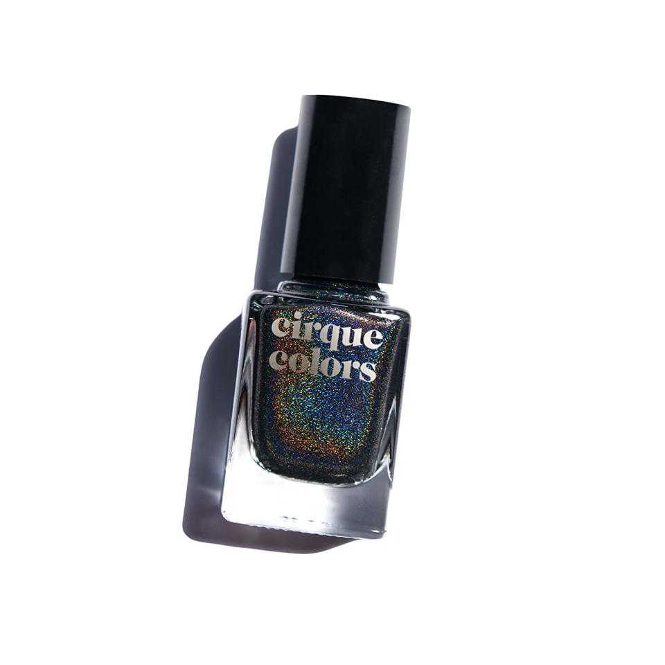 <p>Everyone (including yourself) will do a double take with this multidimensional and changeable nail polish. Every angle will radiate a different color, urging you to embrace transformation and growth this month. You’ll even intoxicate your forward-thinking mind by glaring and staring at your slick paws during the upcoming weeks.</p> <p><strong>To shop: </strong>$14; <a href="https://www.amazon.com/Cirque-Colors-Holographic-Nail-Polish/dp/B00ITZTQPI/ref=as_li_ss_tl?ie=UTF8&linkCode=ll1&tag=isbeunailcolorsforscorpioseasonlstardustoct20-20&linkId=110409776697f405eab596e31d34e7cd&language=en_US" rel="nofollow noopener" target="_blank" data-ylk="slk:amazon.com;elm:context_link;itc:0;sec:content-canvas" class="link ">amazon.com</a></p>
