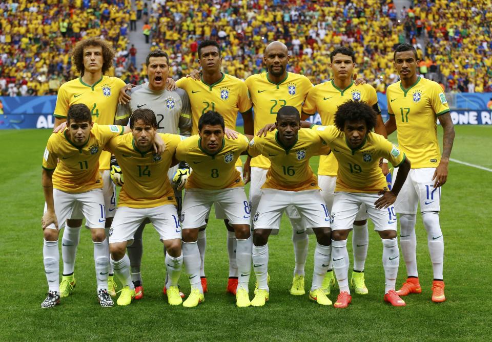 Brazil's players pose before their 2014 World Cup third-place playoff against the Netherlands at the Brasilia national stadium in Brasilia July 12, 2014. REUTERS/Dominic Ebenbichler (BRAZIL - Tags: SOCCER SPORT WORLD CUP)