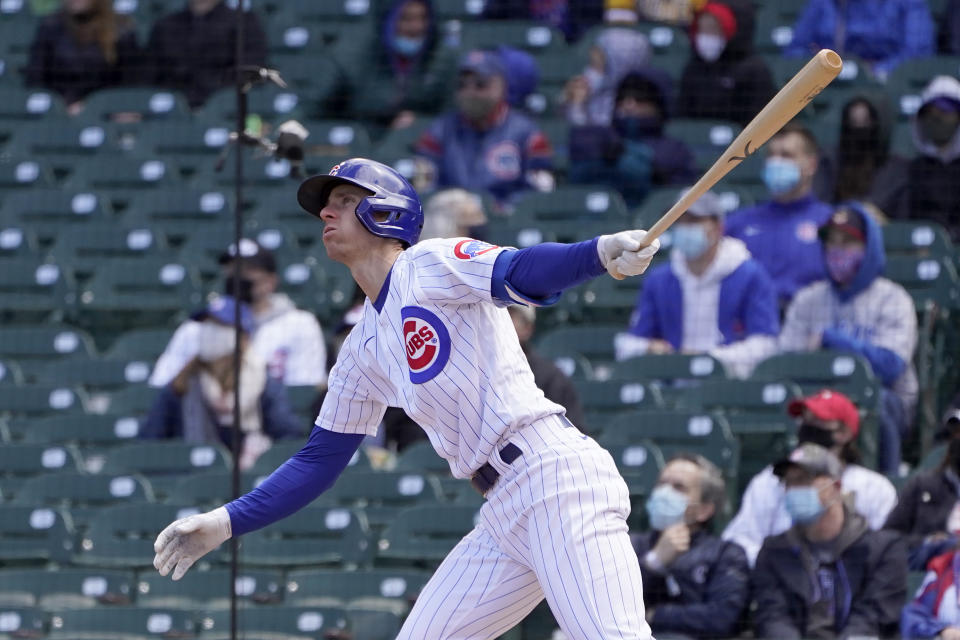 Chicago Cubs' Matt Duffy watches his sacrifice fly off Pittsburgh Pirates starting pitcher Trevor Cahill during the third inning of a baseball game against the Pittsburgh Pirates on Friday, May 7, 2021, in Chicago. Javier Baez scored on the play. (AP Photo/Charles Rex Arbogast)