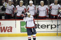 Washington Capitals left wing Alex Ovechkin (8) celebrates his 700th career goal during the third period of an NHL hockey game against the New Jersey Devils Saturday, Feb. 22, 2020, in Newark, N.J. (AP Photo/Bill Kostroun)