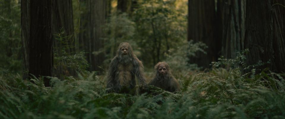 Jesse Eisenberg (left) and Christophe Zajac-Denek are a father-son pair of Sasquatches in the Bigfoot-focused "nature film." "Sasquatch Sunset" features no dialogue and lots of grunting.