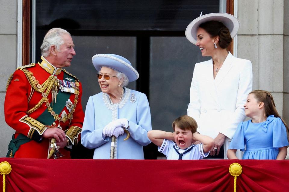 Queen Elizabeth II, Prince Charles and Catherine, Duchess of Cambridge, along with Princess Charlotte and Prince Louis appear on the balcony of Buckingham Palace as part of Trooping the Colour parade during the Queen's Platinum Jubilee celebration (Reuters)