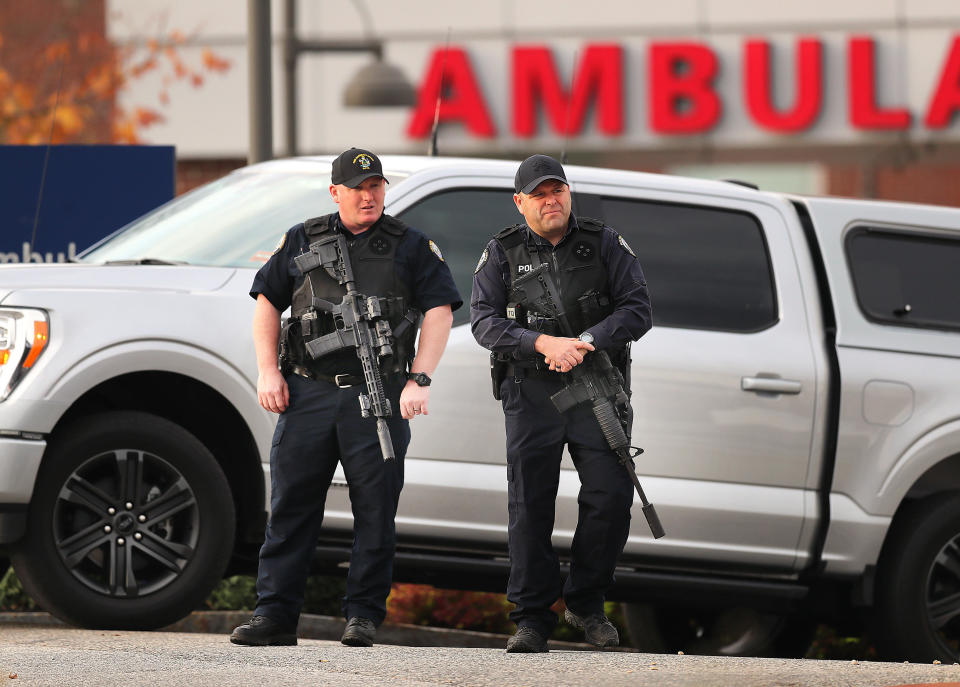 Heavily armed police stand at the ambulance entrance to the Central Maine Medical Center on Oct. 26, 2023, in Lewiston, Maine, where many of the shooting victims were brought. / Credit: John Tlumacki/The Boston Globe via Getty Images