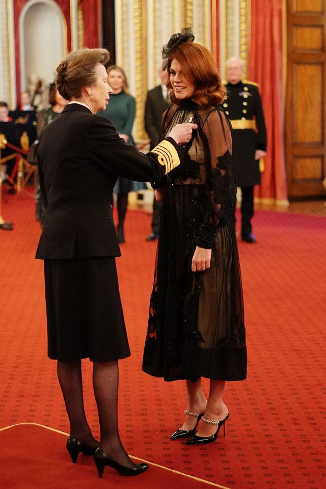 Lauren Steadman being made a Member of the Order of the British Empire by the Princess Royal