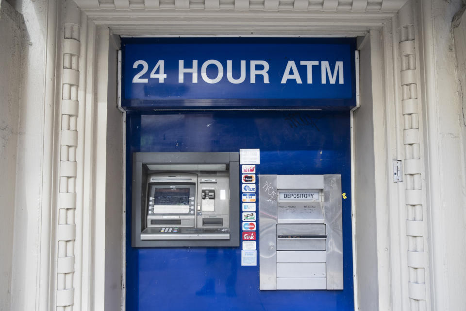 FILE - This Nov. 29, 2018, file photo shows an ATM in Philadelphia. It’s important to find a bank that meets all your unique needs in terms of access, technology and cost. Be sure to consider credit unions or online banks that typically offer lower fees and better interest rates. (AP Photo/Matt Rourke, File)