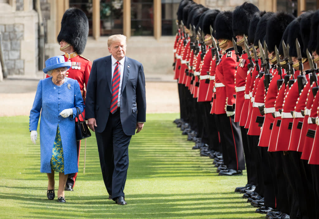 The queen walks with President Trump as they inspect the Coldstream Guards at Windsor Castle. (Photo: Getty Images)