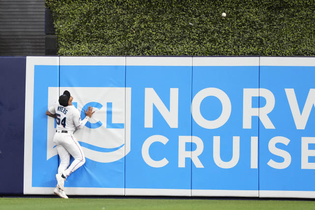 Arenado homers, Cardinals pitchers blank Marlins to win and avoid sweep