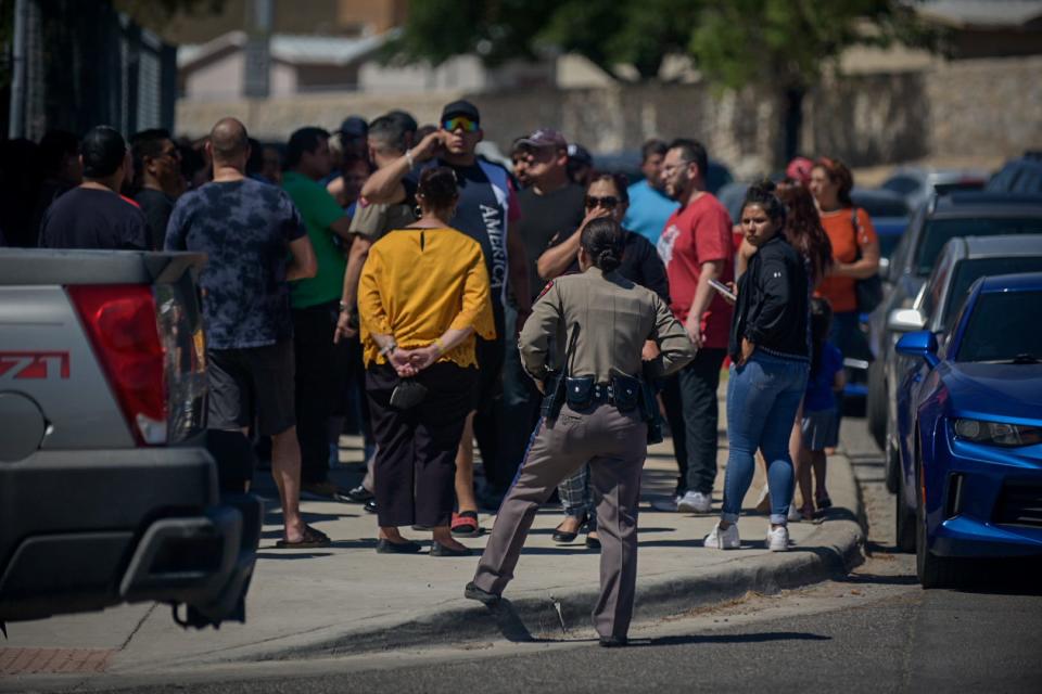 Parents and others wait for children to be released from Bel Air High School on Thursday, May 26, 2022.