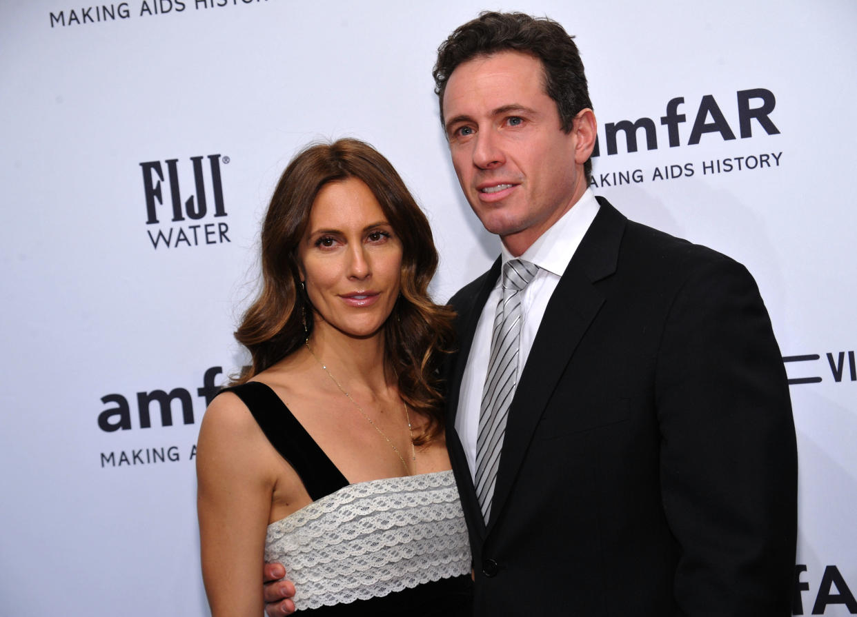 Cristina Cuomo, pictured with husband Chris Cuomo, says she's feeling better after testing positive for the coronavirus. (Photo: Getty Images)