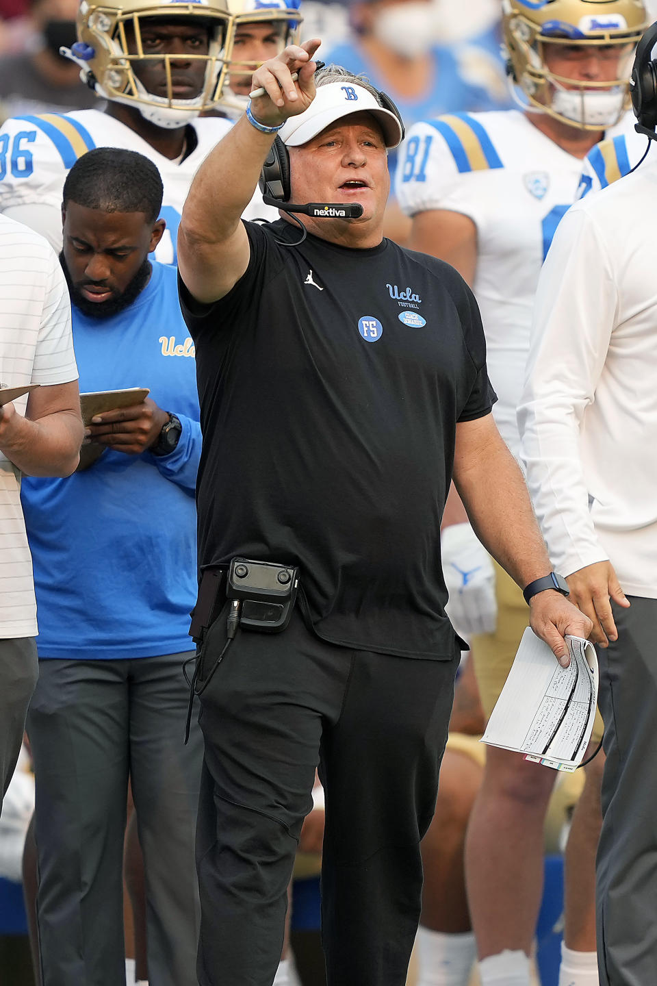 UCLA head coach Chip Kelly calls out to his players during the second half against Stanford in an NCAA college football game Saturday, Sept. 25, 2021, in Stanford, Calif. (AP Photo/Tony Avelar)