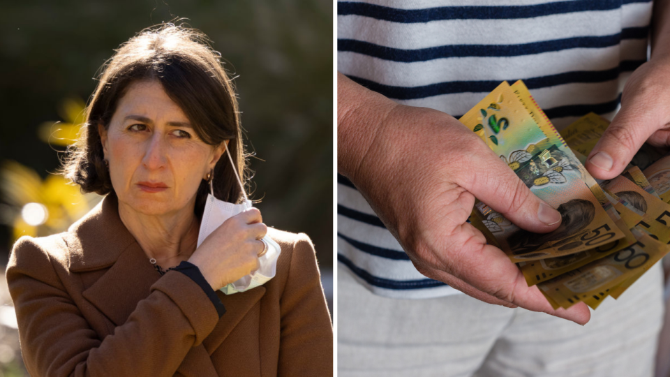 Premier Gladys Berejiklian, person holding Australian $50 notes. 