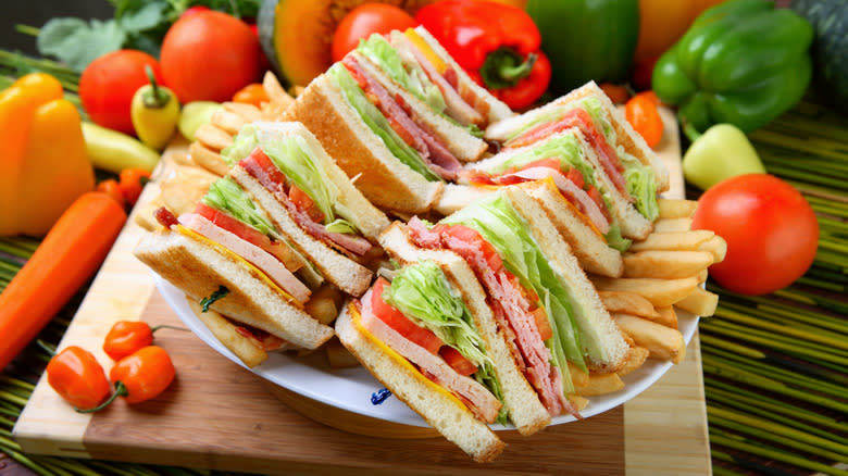 Club sandwich on cutting board